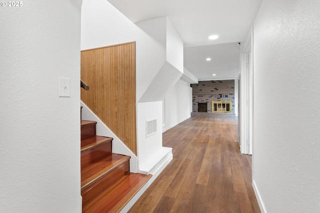 hallway featuring hardwood / wood-style floors