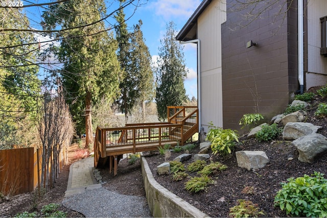 view of yard with a wooden deck