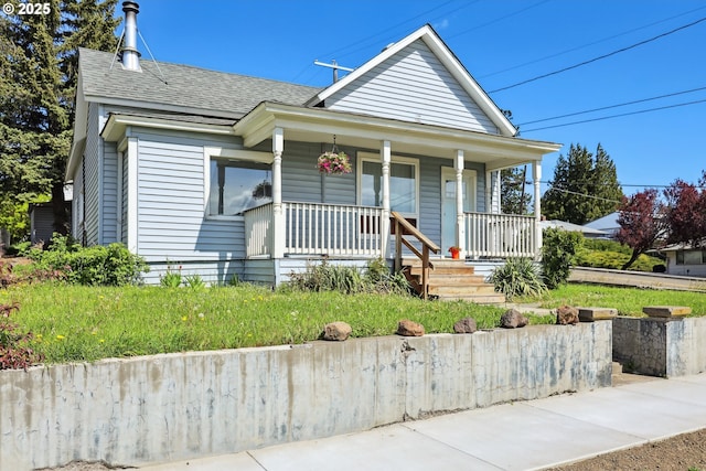 400 Mccoy St, Moro, OR 97039 - view of front facade with a porch and a shingled roof