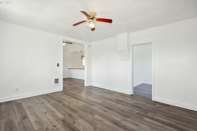 400 Mccoy St, Moro, OR 97039 - empty room featuring visible vents, ornamental molding, wood finished floors, baseboards, and a ceiling fan