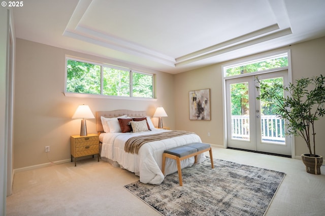 9614 NW Durrett St, Portland, OR 97229 - bedroom featuring a raised ceiling, light colored carpet, access to outside, and french doors