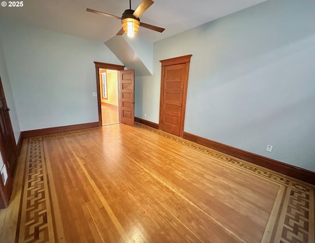 812 SW Saint Clair Ave Unit 3, Portland, OR 97205 - empty room with ceiling fan, light wood finished floors, and baseboards
