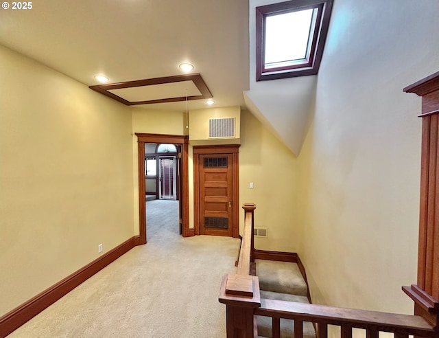 812 SW Saint Clair Ave Unit 3, Portland, OR 97205 - stairs featuring attic access, carpet floors, baseboards, and recessed lighting