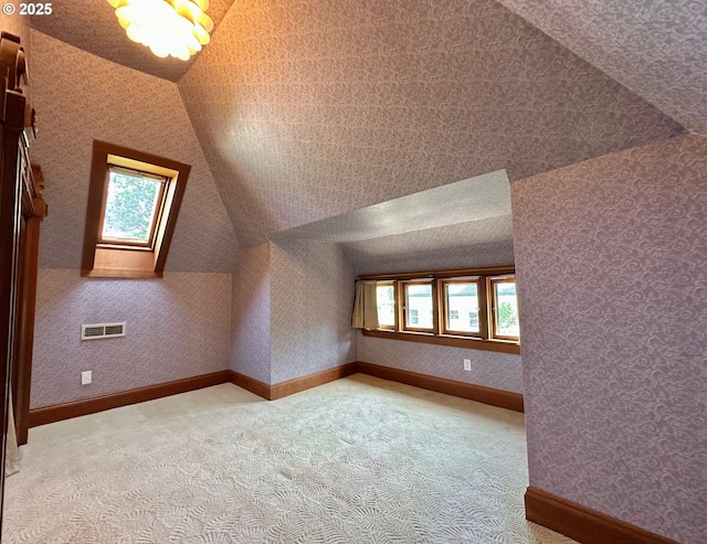 812 SW Saint Clair Ave Unit 3, Portland, OR 97205 - bonus room featuring lofted ceiling and carpet floors