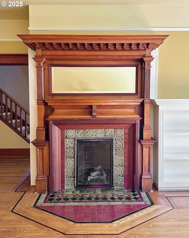 812 SW Saint Clair Ave Unit 3, Portland, OR 97205 - detailed view of a tile fireplace and baseboards