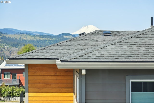 1250 29th St, Hood River, OR 97031 - exterior details featuring a mountain view and roof with shingles
