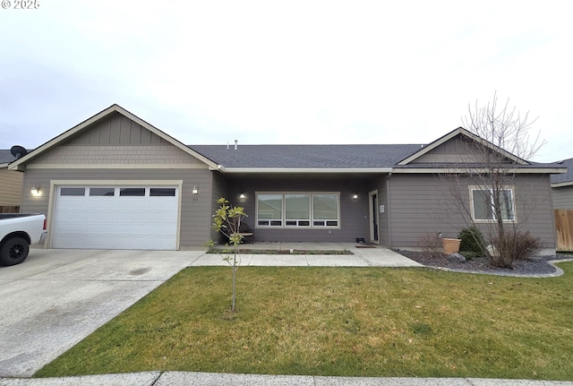 ranch-style house with a front yard and a garage