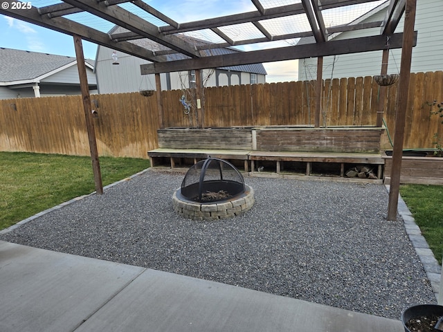 view of patio featuring a fire pit