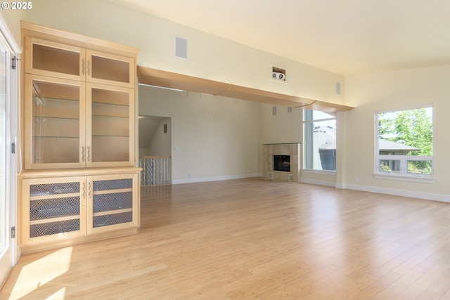 2965 Ingalls Way, Eugene, OR 97405 - unfurnished living room featuring light wood-style floors and a fireplace
