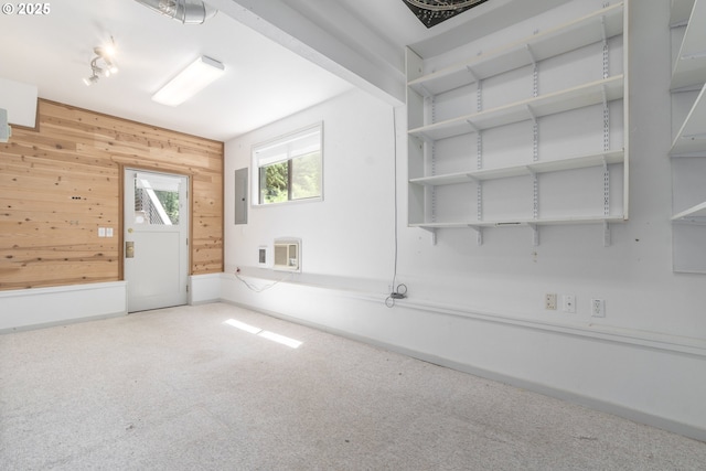 2965 Ingalls Way, Eugene, OR 97405 - unfurnished room featuring wood walls, carpet, and an AC wall unit
