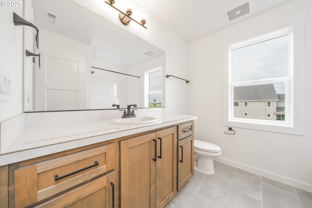 4300 N 12th Way, Ridgefield, WA 98642 - full bath featuring plenty of natural light, vanity, tile patterned floors, and a shower