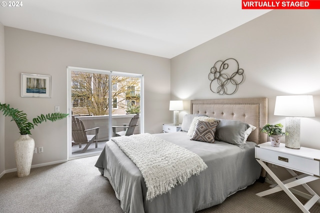 bedroom with access to exterior, carpet floors, and baseboards