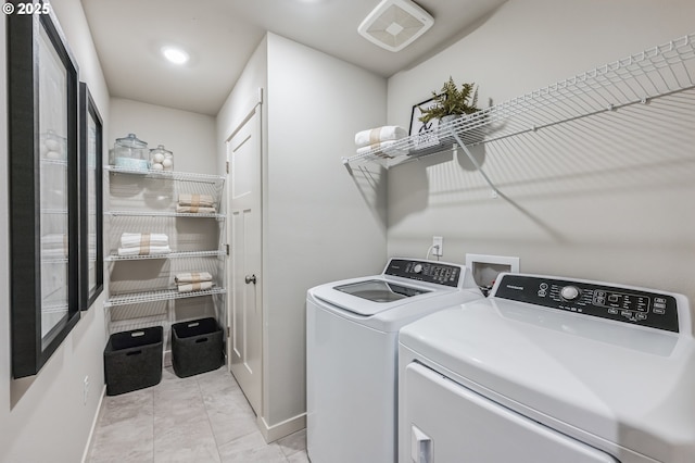 washroom with laundry area, visible vents, baseboards, recessed lighting, and washer and dryer