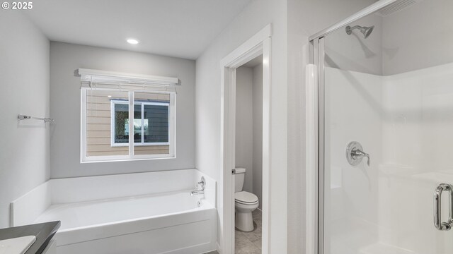 full bath with recessed lighting, a stall shower, toilet, and a garden tub