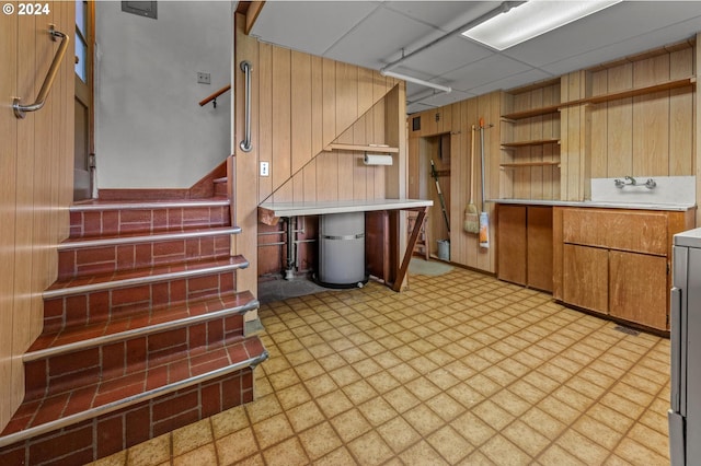 kitchen with wood walls