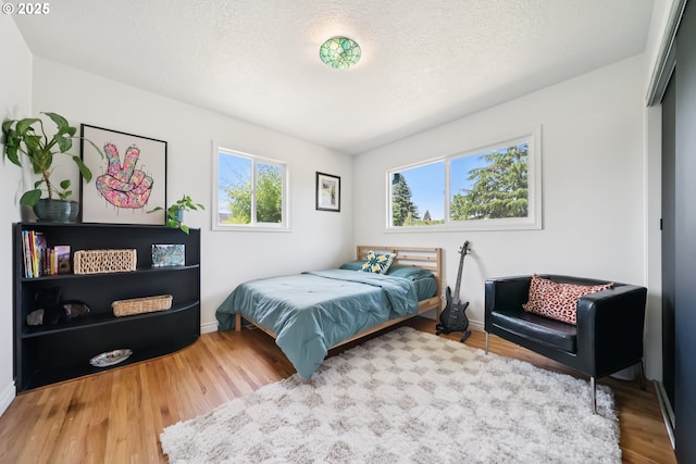 324 NE 108th Pl, Portland, OR 97220 - bedroom with wood finished floors