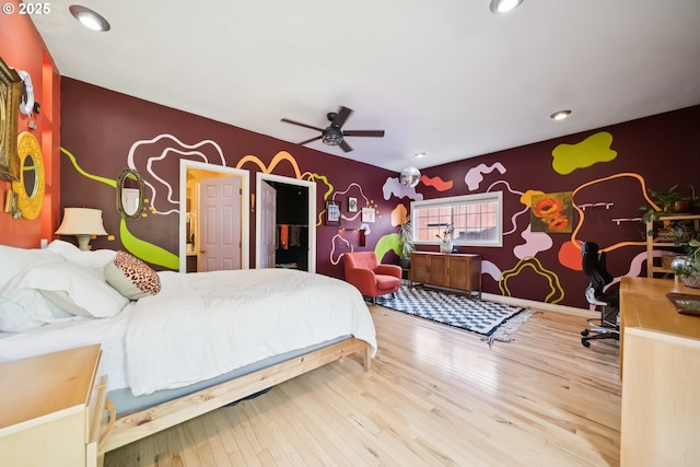 324 NE 108th Pl, Portland, OR 97220 - bedroom with an accent wall, wood finished floors, wallpapered walls, recessed lighting, and a ceiling fan
