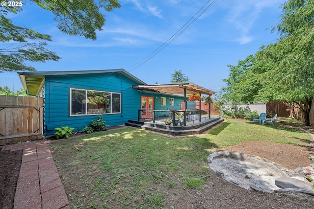 324 NE 108th Pl, Portland, OR 97220 - rear view of property featuring a fenced backyard and a deck