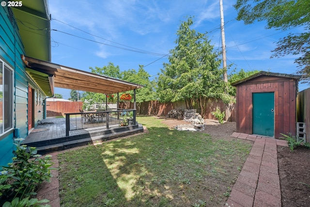 324 NE 108th Pl, Portland, OR 97220 - fenced backyard with a storage shed, a deck, and outdoor dining space