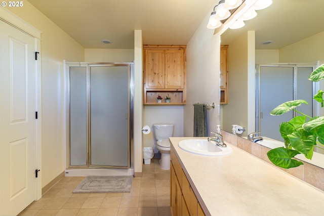 2260 NE 8th St, Hermiston, OR 97838 - full bath featuring vanity, a shower stall, and tile patterned floors