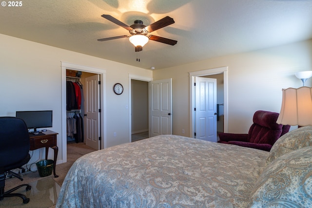 2260 NE 8th St, Hermiston, OR 97838 - carpeted bedroom featuring an office area, a spacious closet, a closet, and ceiling fan