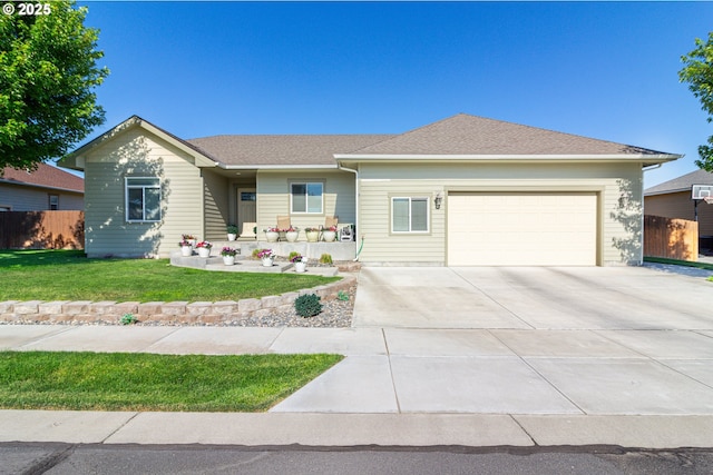 2260 NE 8th St, Hermiston, OR 97838 - ranch-style house with a garage, driveway, and covered porch