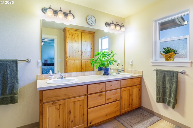 2260 NE 8th St, Hermiston, OR 97838 - full bathroom with double vanity and tile patterned flooring