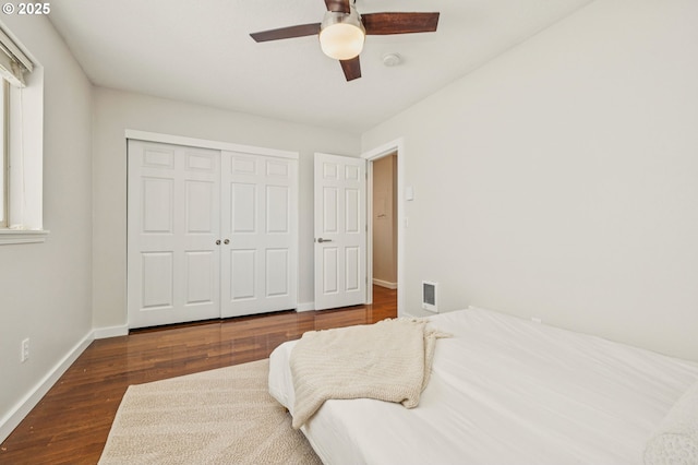 1912 SE 11th Ave Unit 3, Portland, OR 97214 - bedroom featuring wood finished floors, baseboards, a closet, and ceiling fan