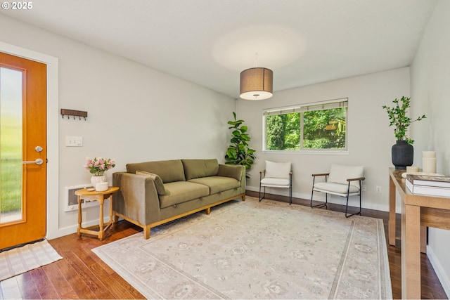 1912 SE 11th Ave Unit 3, Portland, OR 97214 - living area featuring wood finished floors and baseboards