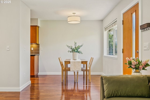 1912 SE 11th Ave Unit 3, Portland, OR 97214 - dining space featuring dark wood finished floors and baseboards