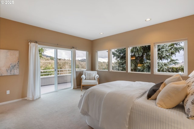 bedroom with recessed lighting, baseboards, light colored carpet, and access to exterior