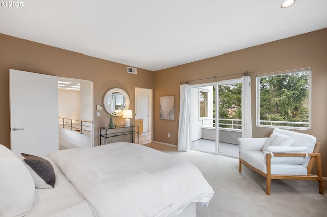 bedroom featuring access to exterior, baseboards, visible vents, and light carpet