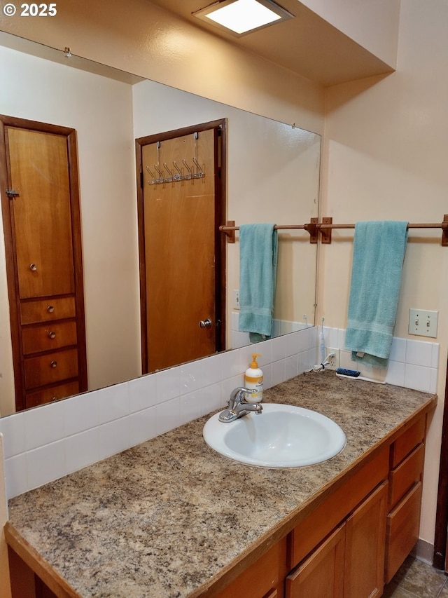1218 SE 162nd Ave, Portland, OR 97233 - bathroom featuring tasteful backsplash and vanity
