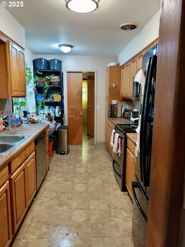 1218 SE 162nd Ave, Portland, OR 97233 - kitchen featuring stainless steel appliances, a sink, light countertops, and brown cabinetry