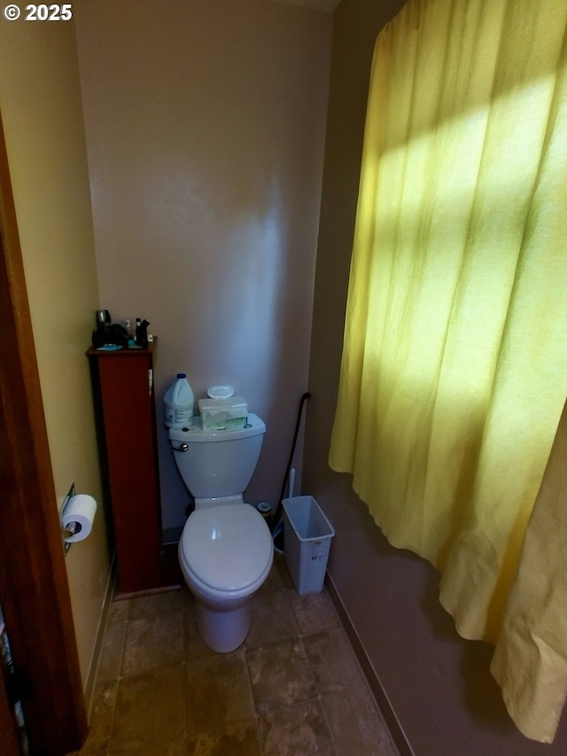 1218 SE 162nd Ave, Portland, OR 97233 - bathroom with toilet and baseboards