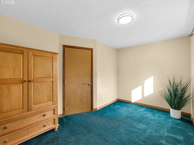 carpeted bedroom with baseboards