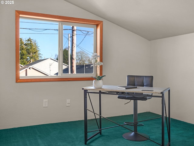 unfurnished office with lofted ceiling and carpet floors