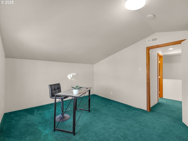 carpeted office with lofted ceiling and visible vents