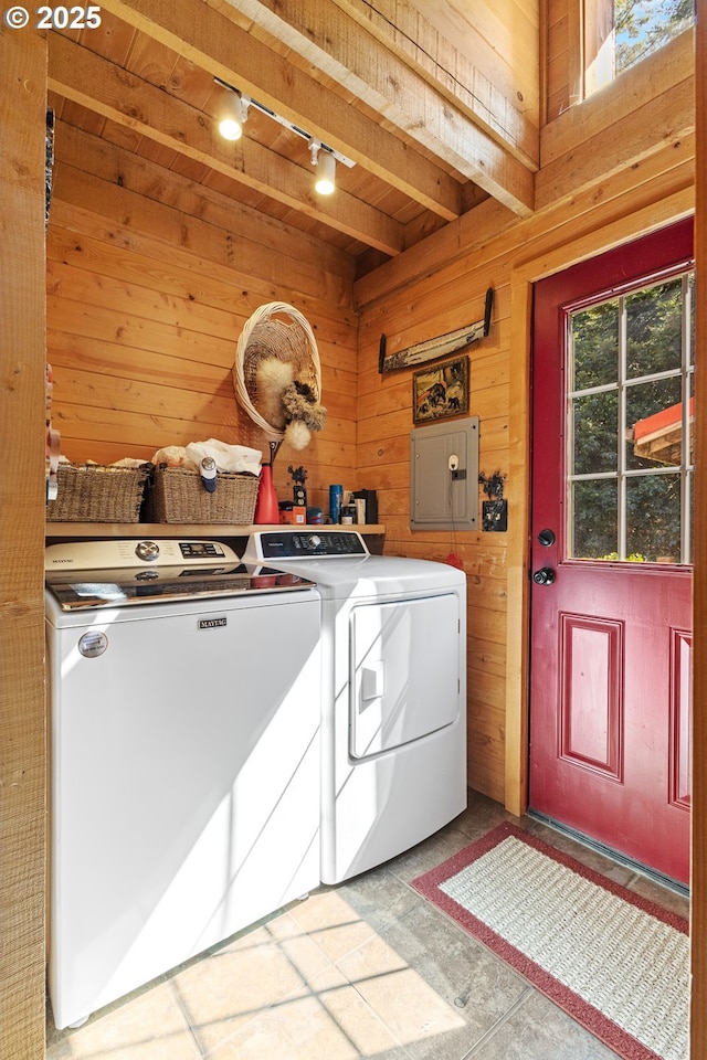 51256 Salmon Gulch Rd, Myrtle Point, OR 97458 - laundry area featuring washing machine and clothes dryer, track lighting, electric panel, and wooden walls
