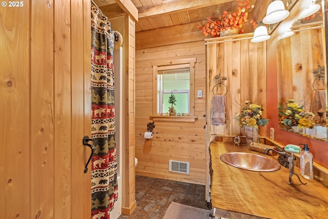 51256 Salmon Gulch Rd, Myrtle Point, OR 97458 - full bathroom featuring wood ceiling, wood walls, vanity, and stone finish flooring