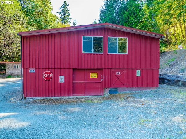 51256 Salmon Gulch Rd, Myrtle Point, OR 97458 - view of side of home with a garage, an outbuilding, crawl space, and a barn