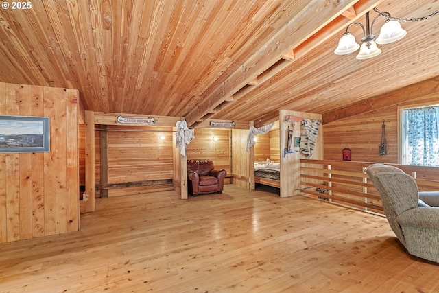 51256 Salmon Gulch Rd, Myrtle Point, OR 97458 - sitting room featuring wooden walls, wood finished floors, wooden ceiling, and a chandelier