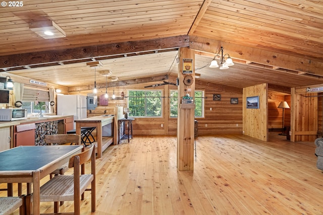51256 Salmon Gulch Rd, Myrtle Point, OR 97458 - dining space featuring wood walls, wood ceiling, light wood-type flooring, and a chandelier