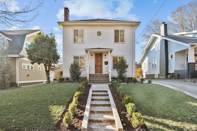 view of front of property featuring a front yard