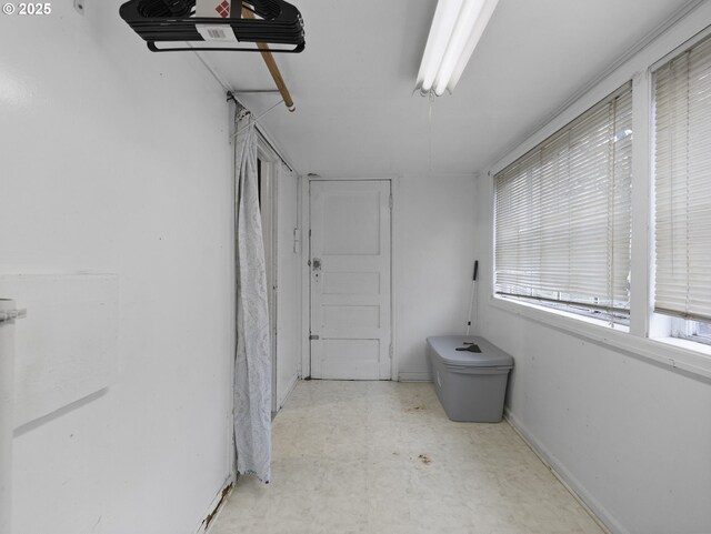 bathroom featuring baseboards and tile patterned floors