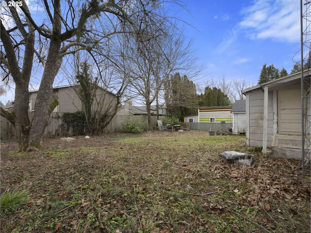 view of yard featuring fence