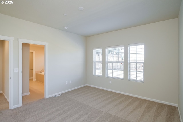 empty room with light carpet