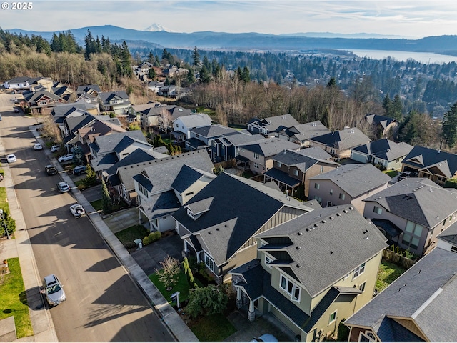 aerial view with a residential view and a mountain view