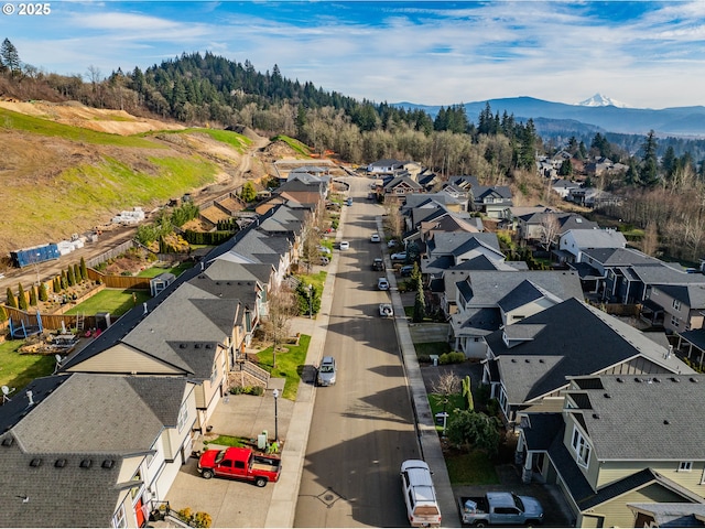 bird's eye view with a residential view and a mountain view