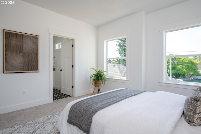 319 N Holland St, Portland, OR 97217 - bedroom with carpet flooring and baseboards